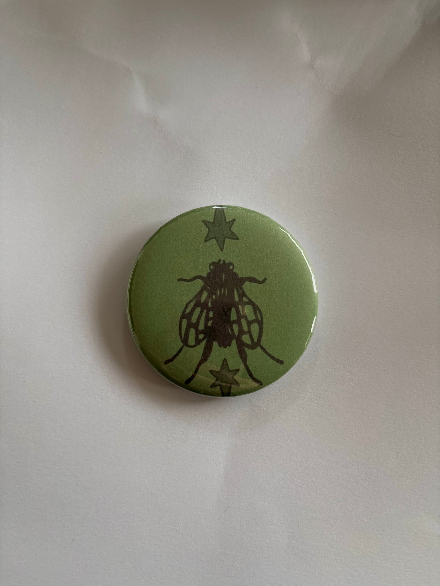 star fly button pin