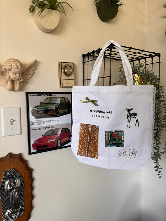 everything eats and is eaten tote bag